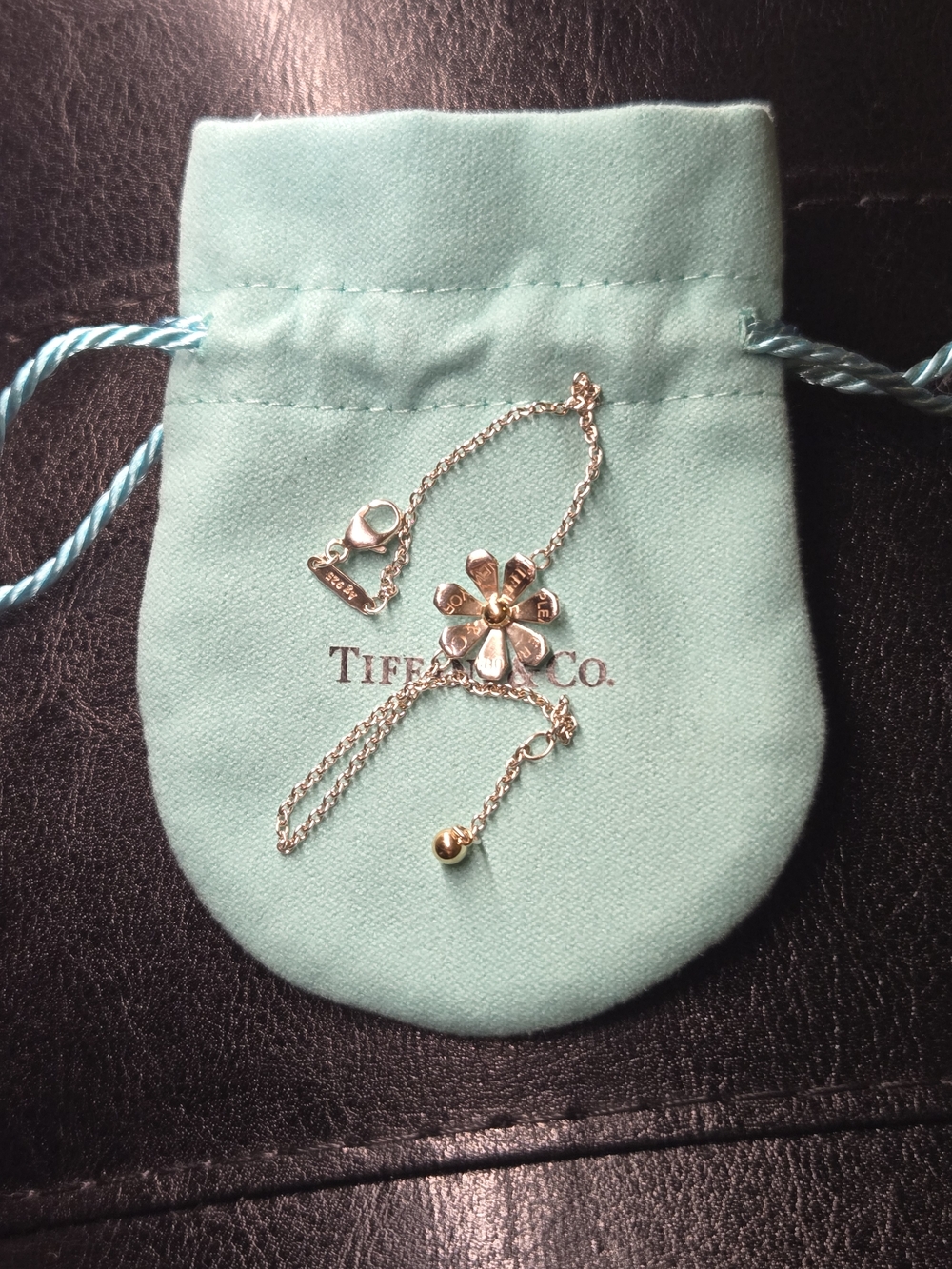 Return to Tiffany Love
Bugs Daisy Chain Bracelet in Sterling Silver and 18k Gold